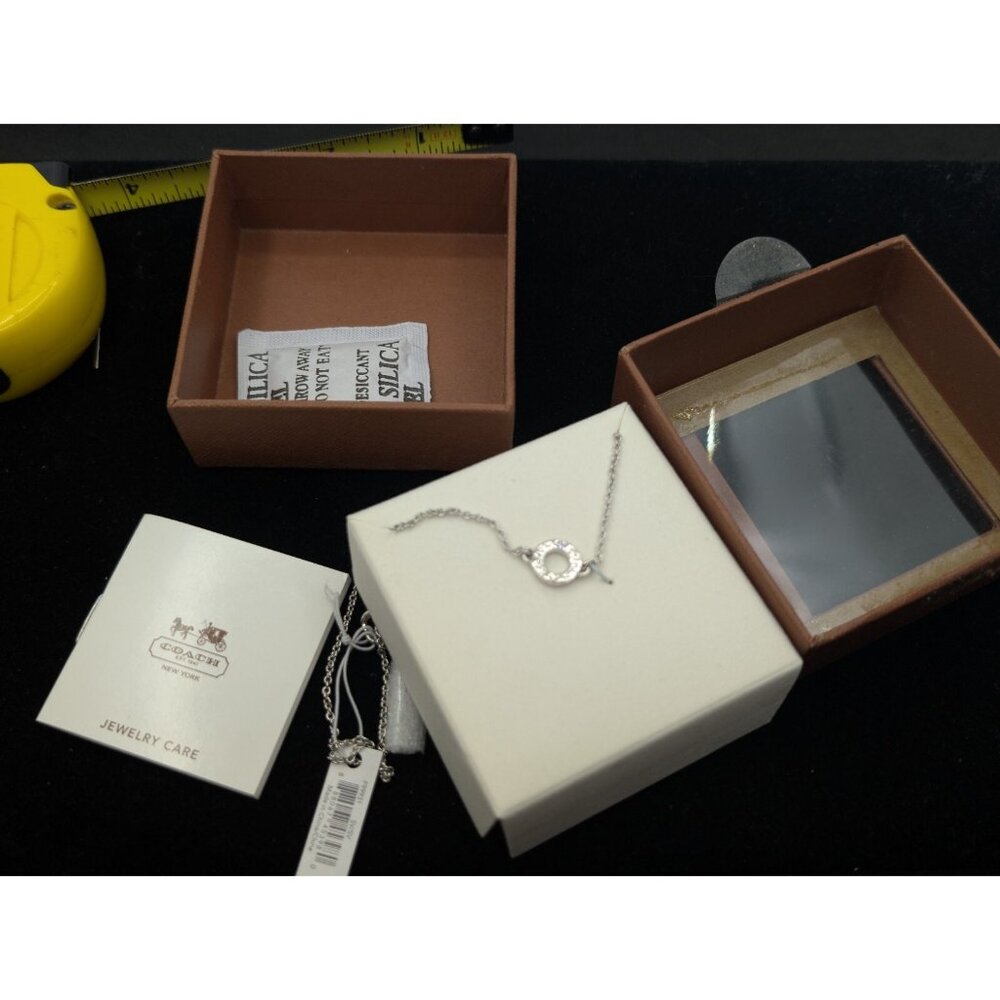 COACH Signature Circle Logo rhinestone Silver Necklace Open Damaged Box - Picture 3 of 12